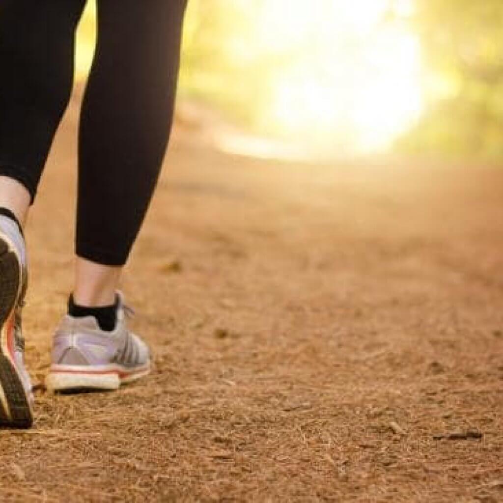 pain in back of knee and down calf when walking