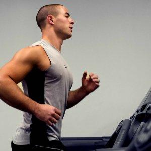 Running on a treadmill thereby including some aerobic exercising