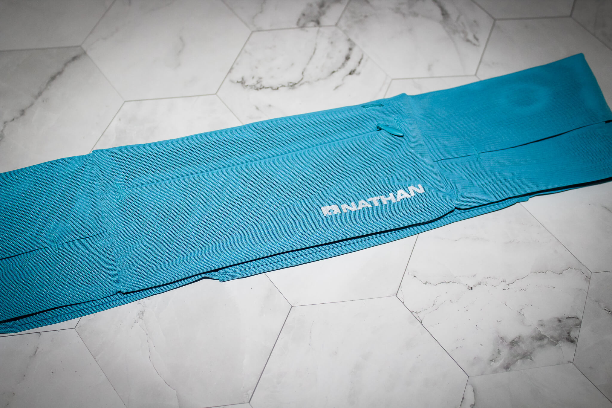 Nathan Zipster Lite Review: How It Compares To FlipBelt