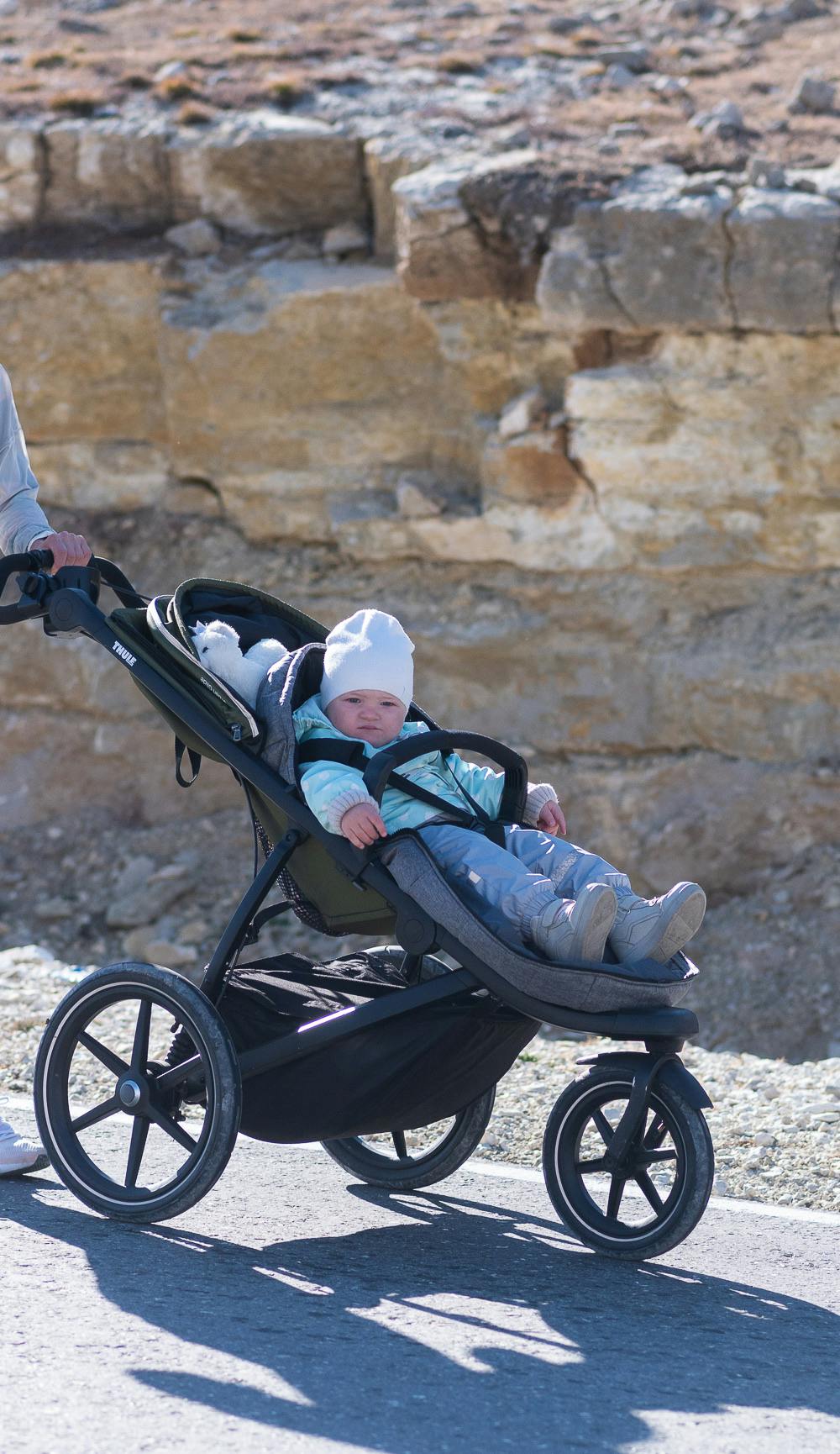 Mother and baby in a jog stroller